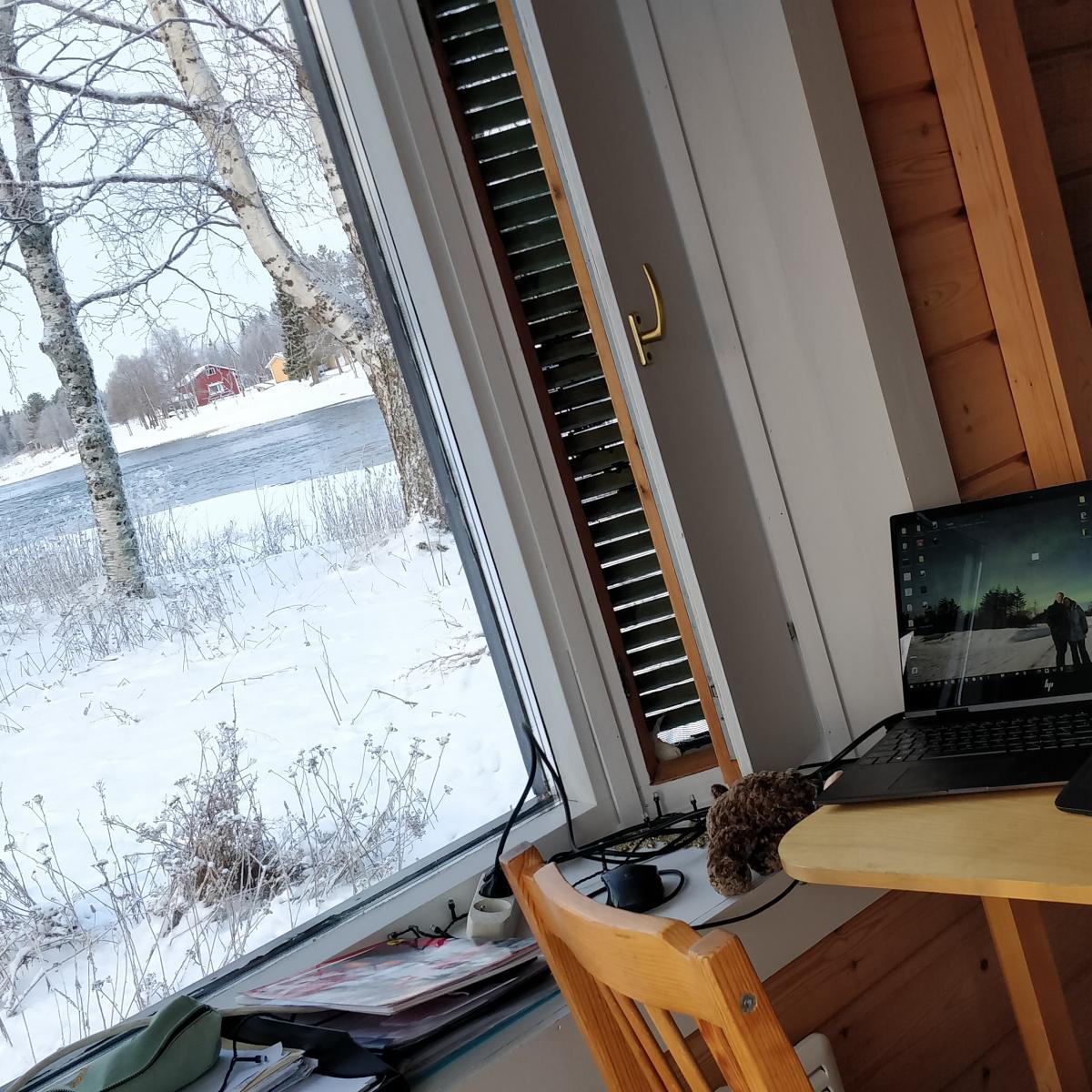 drawing studio in Lapland, with a beautiful view outside. The landscape inspired me to draw 'Small Village', artwork by Aurealis Creatief
